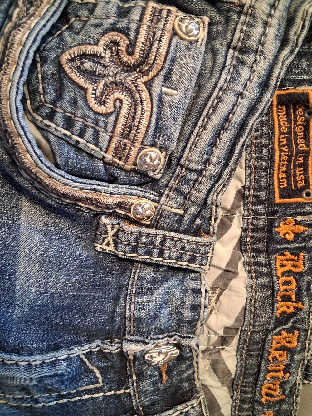 Rock Revival Men's Faded Blue Slim Straight Jeans with Embroidered Detail